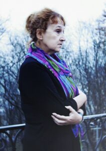 Side portrait waist to head of poet Elina Sventsytska