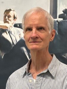 poet ken Holland headshot in front of 