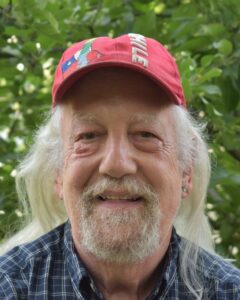 Headshot of poet Patrick Cabello Hansel